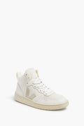 A single white high-top VEJA sneaker with white laces, a perforated toe, beige side V logo, and white rubber sole—crafted from sustainable materials.
