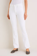 Fairest Of Them All The Hustler Ankle Fray jeans feature a classic high rise and effortless kick flare, paired with dark slip-on flats for a fun, high-end look.