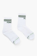 A pair of Tnuck Sport white crew-length socks with green stripes and text, laid flat.