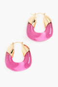 Gold-plated hoop earrings with translucent pink acrylic bottoms by Lizzie Fortunato.