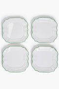 Set of four white square melamine dinner plates by Two's Company, featuring scalloped edges and green trim. Shatter-resistant and arranged in a 2x2 grid, they're ideal for your next garden soiree.