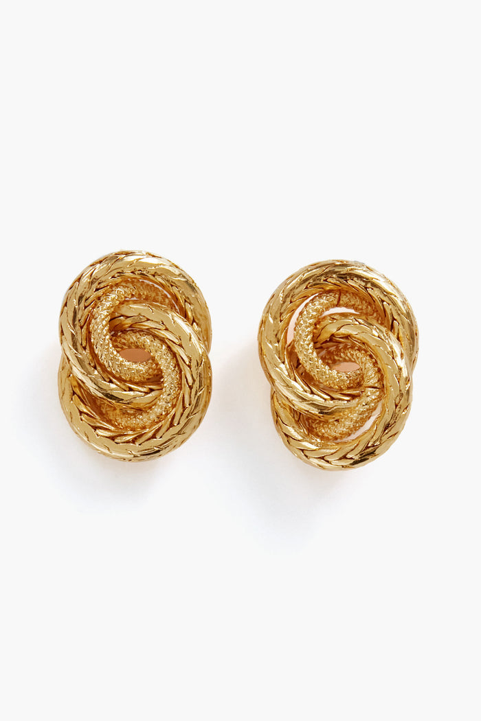 Petit Moments gold-plated brass knot stud earrings showcase an intricate, textured braided design with interlocking details.