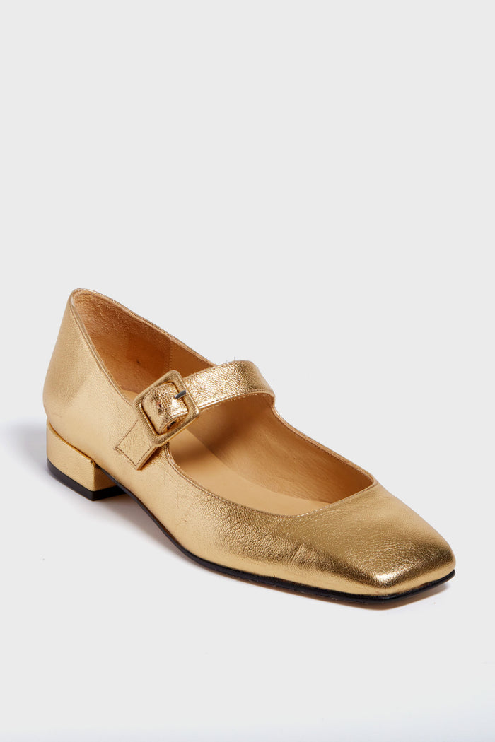 A gold metallic leather Mary Jane flat by Penelope Chilvers, featuring a low square heel and buckle strap.