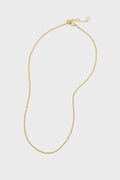 This Tuckernuck Jewelry gold link chain necklace features a lobster clasp and adjustable links, ideal for layering or adding your favorite charm.