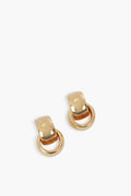 Mignonne Gavigan gold-tone clip-on earrings with a curved rectangular top and circular hoops—perfect for lovers of unique jewelry.
