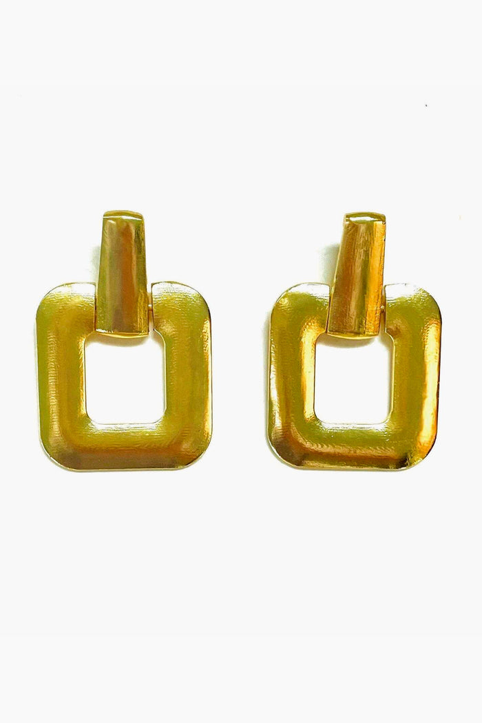 A pair of gold mod square earrings with rounded edges and a rectangular top from Modafleur, a Nashville lifestyle brand—perfect for making a bold statement.