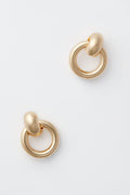 Minimalist gold hoop earrings by Jenny Bird featuring a rounded, smooth design—an ideal addition to any minimalist earring collection.