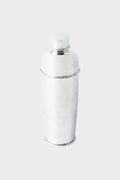 The Juliska hammered stainless steel cocktail shaker features decorative rope detailing around the lid, neck, and base—perfect for any mixologist’s collection.