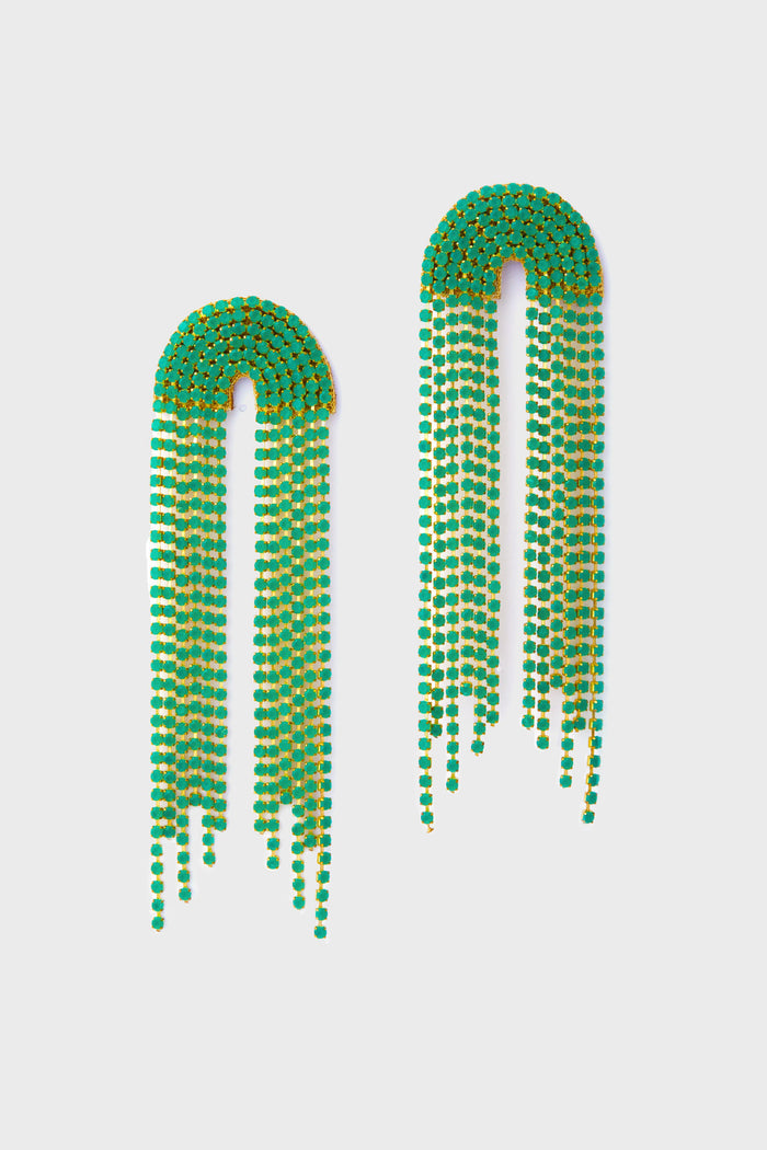 Deepa Gurnani’s long fringe earrings feature green and yellow crystals with an arched top and multiple dangling strands, handcrafted and inspired by Indian hand embroidery.