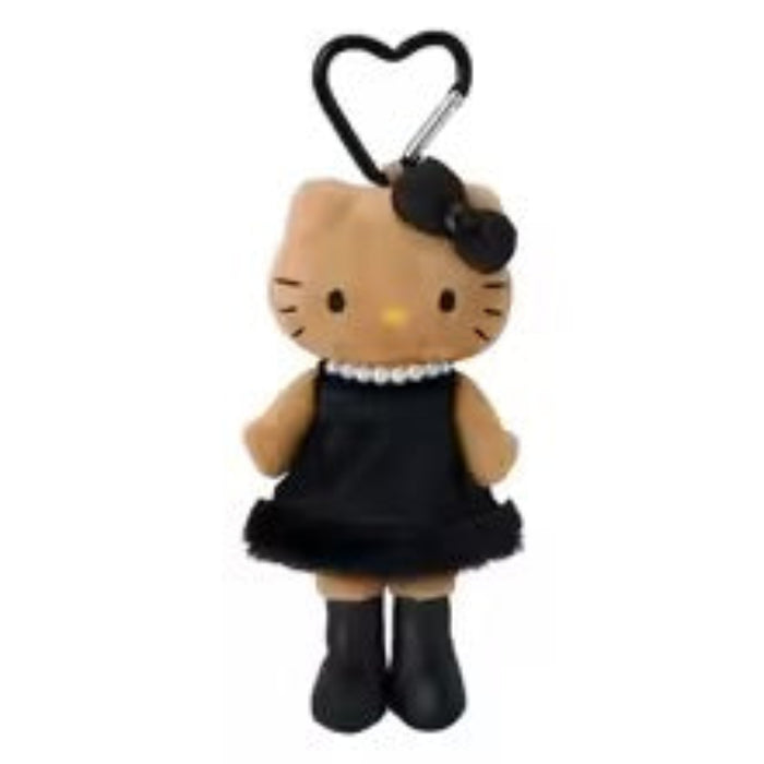 Plush keychain of a cat in a black dress with a heart-shaped clip on a white background