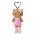 A Hello Kitty plush keychain in a pink dress with a pink bow, attached to a silver metal heart-shaped clip, shown against a plain white background.