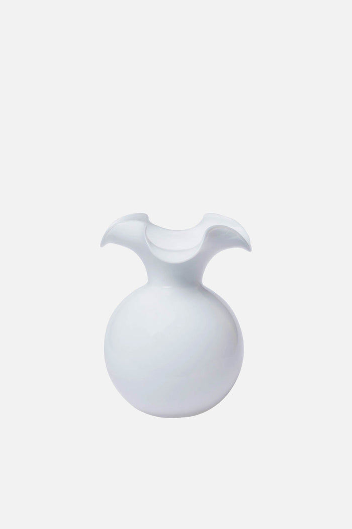 A white, round handmade Vietri vase with a wide, wavy flared opening, inspired by the Hibiscus Glass Fluted Vase design.