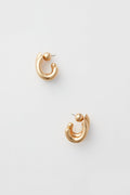 Jenny Bird gold-toned chunky hoop earrings with a curved design—stylish fashion jewelry to elevate any outfit.
