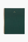 A spiral-bound APPOINTED Hunter Green Lined Notebook with a textured book-cloth cover, gold branding at the top, and made from recycled paper.
