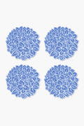 Chefanie’s set of four round blue linen coasters features a white hydrangea floral design, arranged in a 2x2 grid—perfect for adding coastal charm to your table setting.