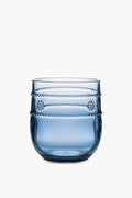 The Juliska Al Fresco tumbler is blue, made from BPA-free acrylic, and features a rounded base with textured horizontal bands near the top. It's dishwasher safe for easy cleaning.
