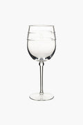 Juliska wine glass with a round bowl featuring two decorative horizontal bands in the Isabella motif, set on a slender stem and circular base.