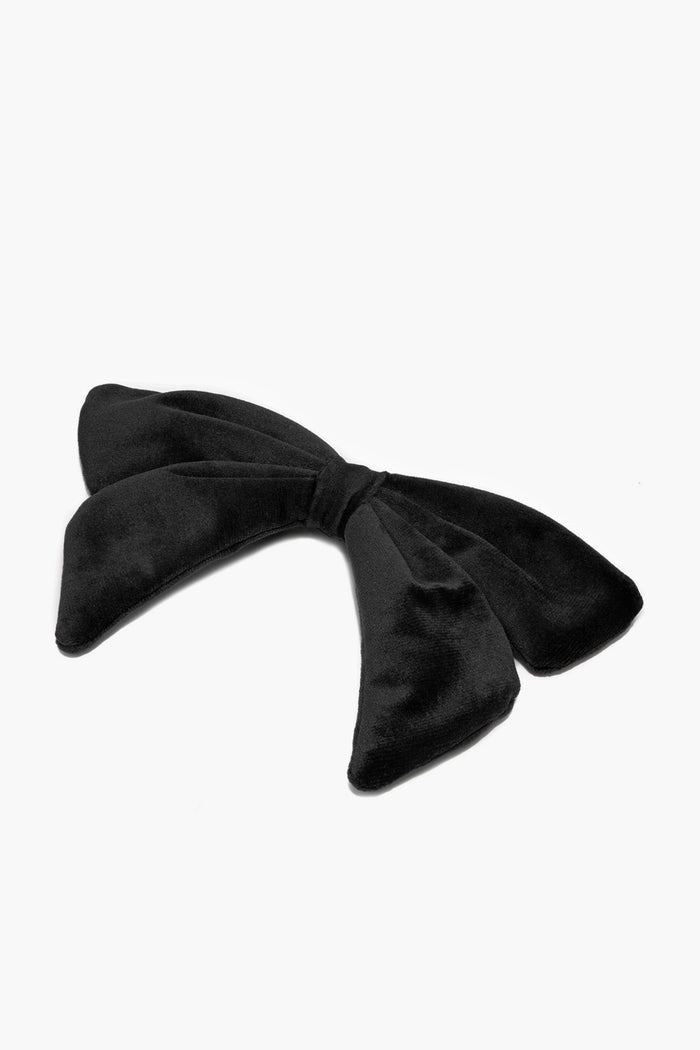 This black velvet oversized bow barrette by Lele Sadoughi features two wide tails, adding an elegant touch to your hairstyle.
