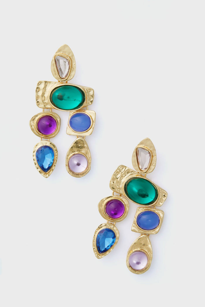 The Petit Moments Jewel Multi Stone Earrings are gold-plated chandeliers with textured surfaces, adorned with green, blue, purple, and clear gemstones in assorted shapes and sizes for a vibrant, elegant touch.