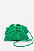 The Urban Expressions small green woven vegan leather crossbody bag features a gathered top and a thin shoulder strap.