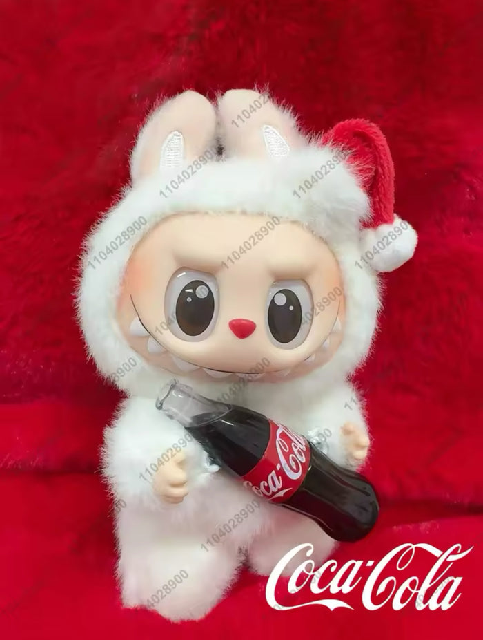 Join the mischievous monsters on their holiday adventure with Labubu Coca Cola Series (Blind Box)! Unbox a quirky, fun surprise with every purchase. Limited edition collectibles that will bring joy and laughter to any collection. Don't miss out on the holiday fun!&nbsp;