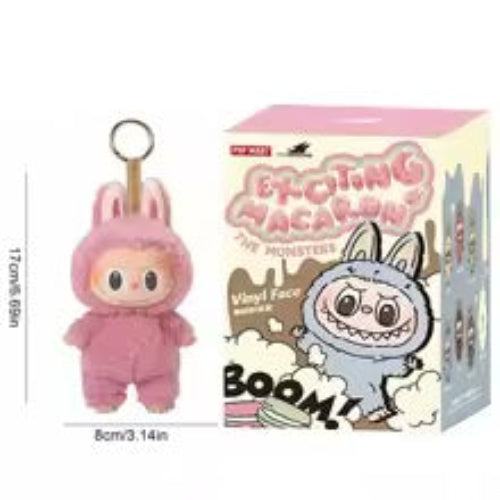 Pink Labubu monster doll with box.