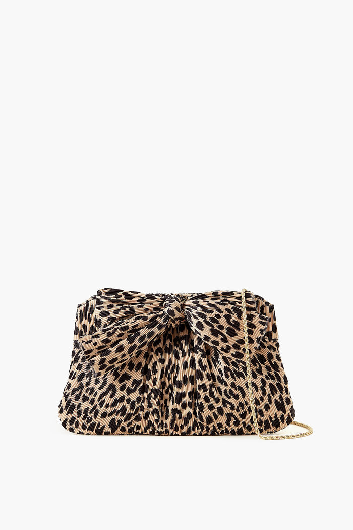 A Loeffler Randall leopard pleated lamé clutch featuring a large front bow and a gold metal chain strap.