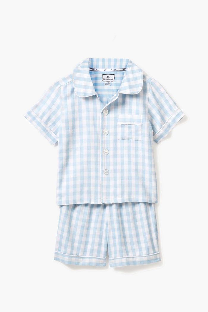 Petite Plume light blue and white gingham short-sleeve cotton pajama set includes a button-up shirt and matching shorts—perfect sleepwear for kids.