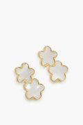 Adorn your ears with ASHA's gold-trimmed, mother-of-pearl four-petal flower Lilia Ear Climbers—stunning floral earrings that make a bold statement.