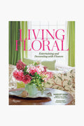 Rizzoli's book cover for "Living Floral: Entertaining and Decorating with Flowers" features a chic flower arrangement in a vase on a table, set in a bright, floral-themed room—ideal for home decor inspiration.