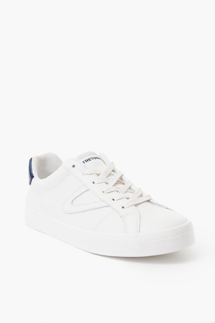 A single Tretorn Mason Leather Sneaker in white, featuring white laces and a blue heel detail, is displayed to showcase its classic sneaker design.