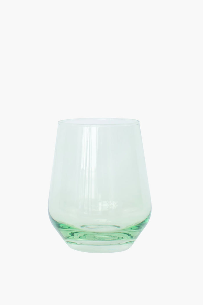 The Estelle Colored Glass tumbler features a wide base, narrow opening, and clear glass with a hint of green—ideal for anyone who appreciates luxury glassware.