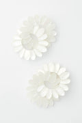 Tuckernuck Jewelry pairs two white, flower-shaped hair clips with petal designs and elegant Mother of Pearl Earrings for a charming accessory ensemble.