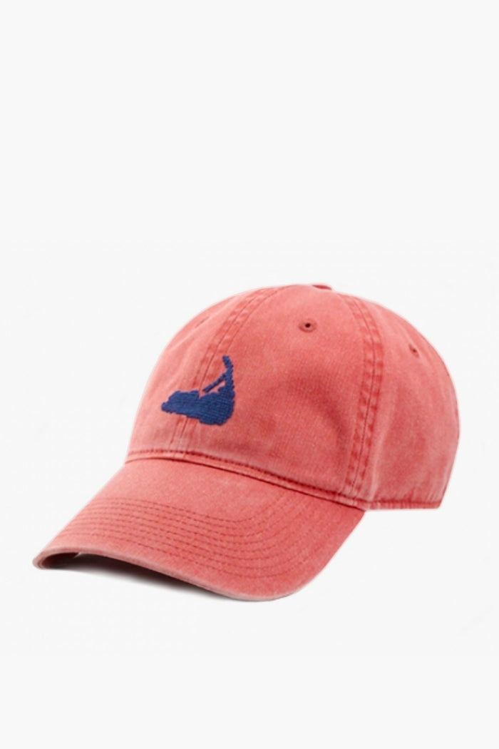 The Smathers and Branson Nantucket Red Island Hat is made from cotton twill with visible stitching and a blue embroidered Cape Cod outline on the front.