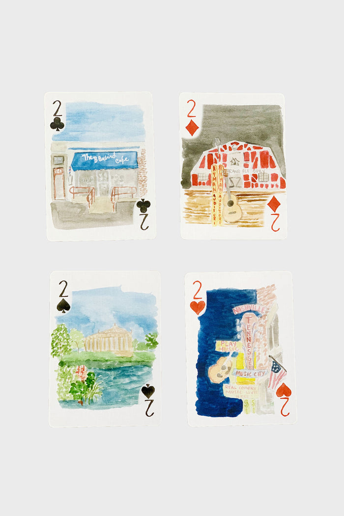 Four watercolor playing cards by LouLou Baker, each a 2 of clubs or hearts, feature hand-painted Nashville buildings—perfect as a unique hostess gift or for collectors of Nashville playing cards.