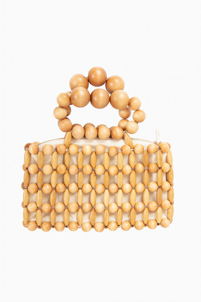 Featuring interwoven light wooden beads and a beaded handle, this rectangular bag from Cult Gaia is a distinctive accessory.