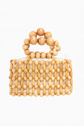 Featuring interwoven light wooden beads and a beaded handle, this rectangular bag from Cult Gaia is a distinctive accessory.