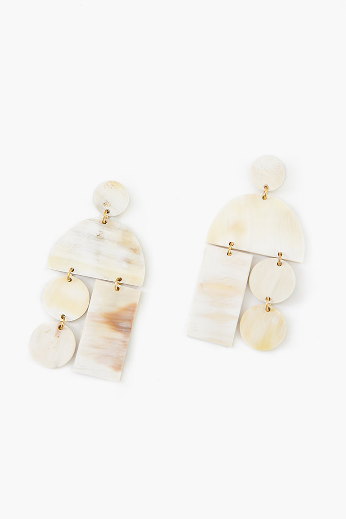 Sunshine Tienda’s lightweight earrings feature cream and beige marbled geometric shapes linked by gold-toned connectors in a cruelty-free, horn dangle design.