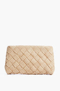 The Loeffler Randall Natural Aviva Puff Clutch is a rectangular beige raffia clutch featuring a woven, basket-like texture for effortless style.