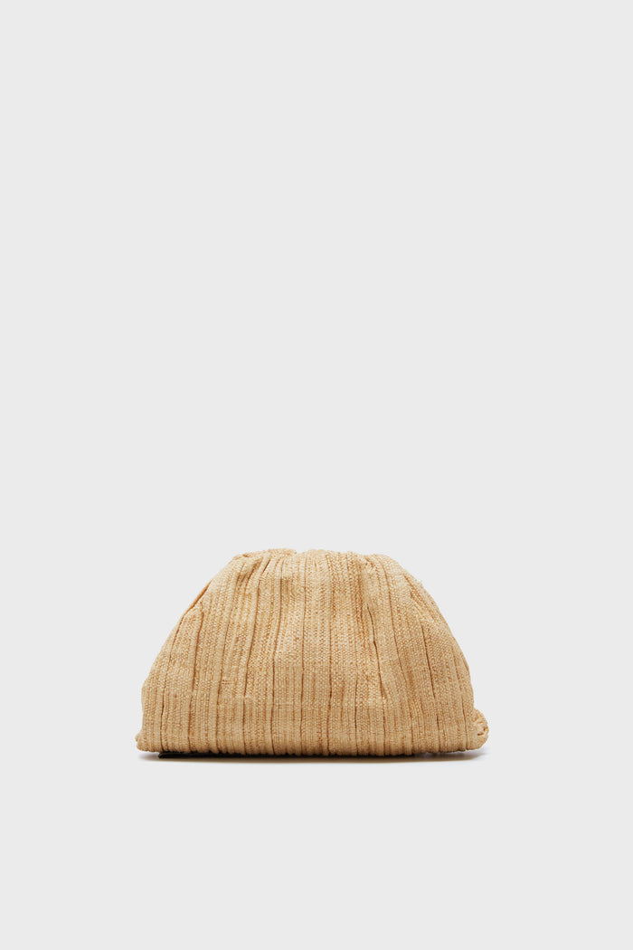 A textured beige Loeffler Randall clutch features a gathered, ruched design and an elegant gold chain strap, displayed upright.