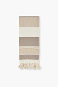 Caton's Wharf beige and brown striped woven towel with fringe and natural texture—ideal as a kitchen towel or thoughtful hostess gift.
