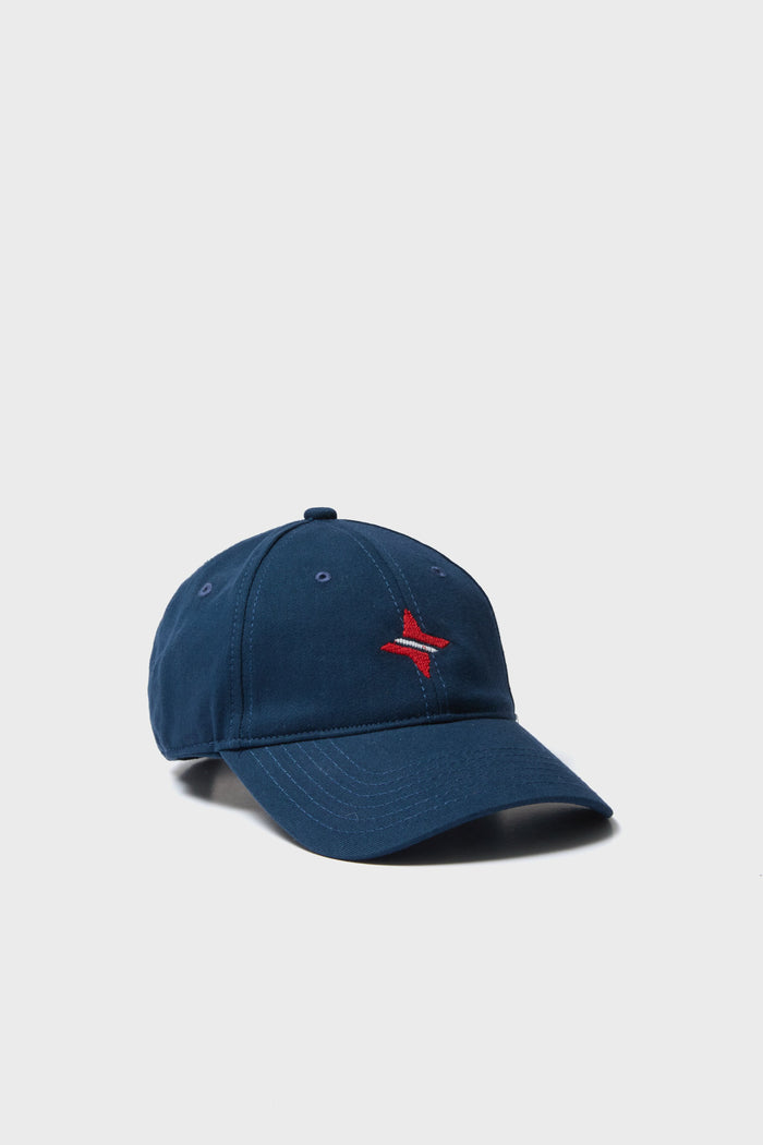 Harding-Lane navy blue baseball cap featuring a red embroidered star-like symbol on the front—ideal for fans of needlepoint hats and Tuckernuck logo styles.