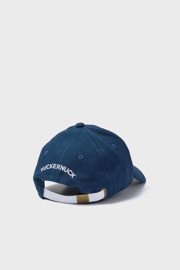 Navy Americana Tuckernuck Hat with classic needlepoint embroidery, featuring a deep fit and effortless sailcloth strap for fun, high-end style.