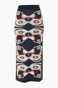 ALEXIS Navy Nylah Skirt: Midi knit skirt with a geometric abstract pattern in navy, rust, white, and light blue, featuring side slits for a modern womenswear look.