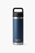 A YETI Rambler Bottle in navy blue stainless steel with double-wall vacuum insulation and a black handle lid, shown standing upright.