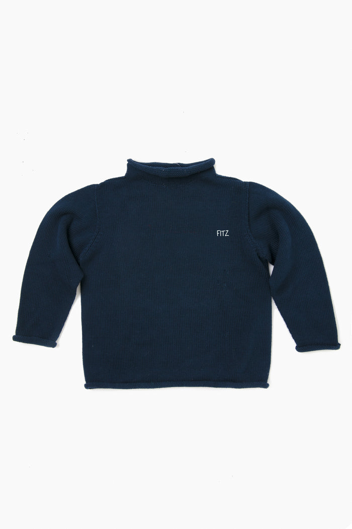 A Soft Idea navy blue cotton kids sweater with long sleeves, mock neck, and FITZ monogram on the left chest.