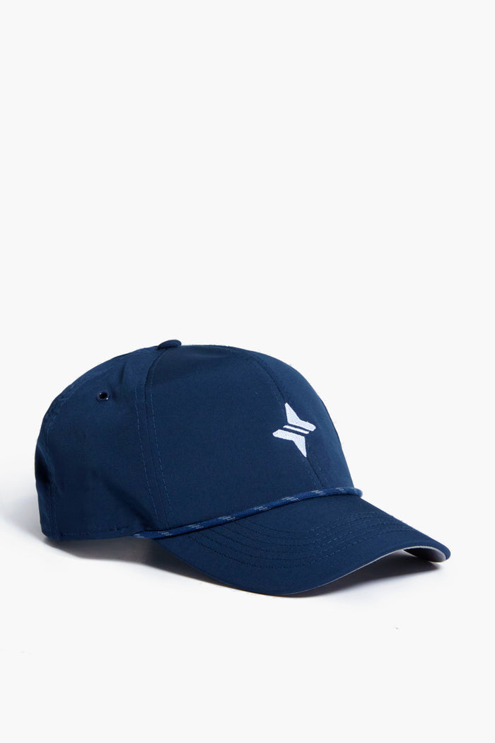 The Tnuck Sport x Imperial navy blue rope hat features a small white geometric logo on the front and an adjustable Velcro strap for a perfect fit.