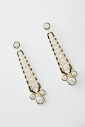 A pair of gold and black art deco earrings by Nicola Bathie, featuring multiple round and square clear gemstones arranged in a symmetrical, vintage-inspired design.