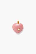 Tuckernuck Jewelry’s pink heart-shaped pendant features a small round gemstone and gold loop, making it the perfect Opal Birthstone Charm or October birthday gift for a charm necklace.