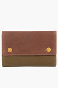 A brown and olive green Barbour wallet with a textured finish and two gold snap buttons on the front flap—ideal for carrying your manicure set or travel grooming kit.